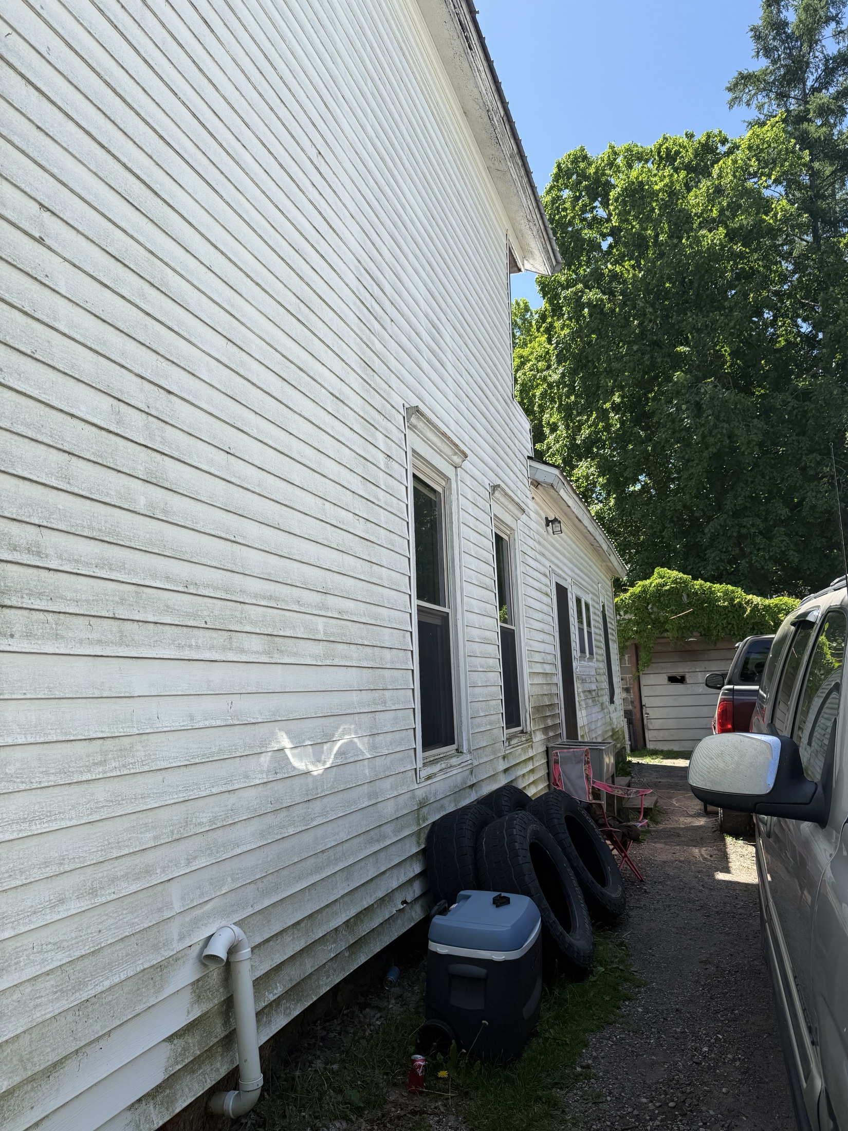 Exterior surface prepared for pressure washing